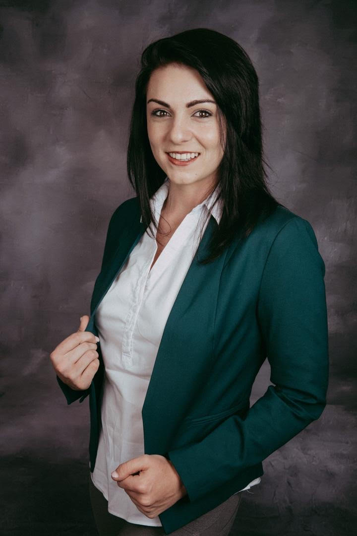 A portait photo of Mari-Louise du Plessis who is a real estate agent in Namibia.